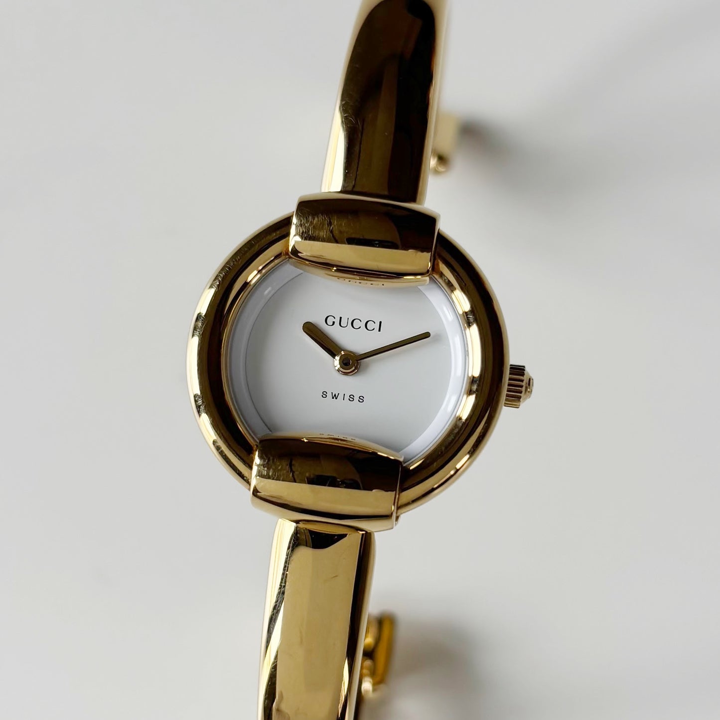 Gucci 1990s Round Dial Gold Plated Bangle Watch