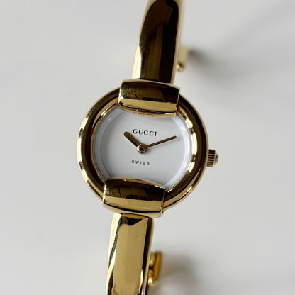 Gucci 1990s Round Dial Gold Plated Bangle Watch