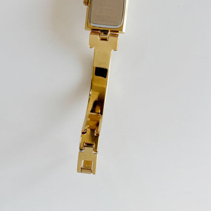 Givenchy 1990s Rectangular Dial Gold Plated Bangle Watch