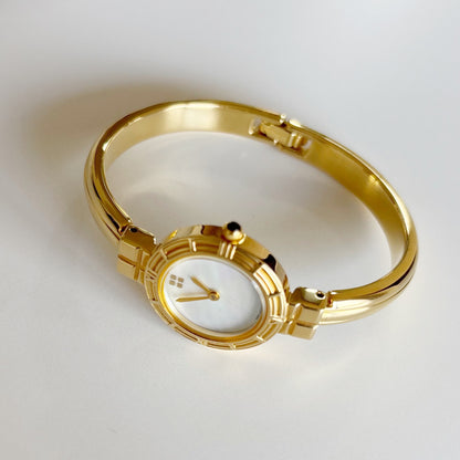 Yves Saint Laurent 1990s Seashell Dial Gold Plated Bangle Watch (Small)