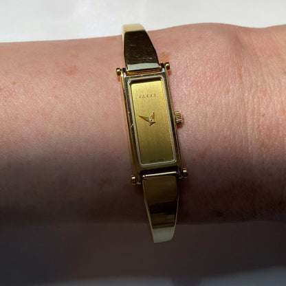 Gucci 1990s Rectangular Gold Plated Bangle Watch