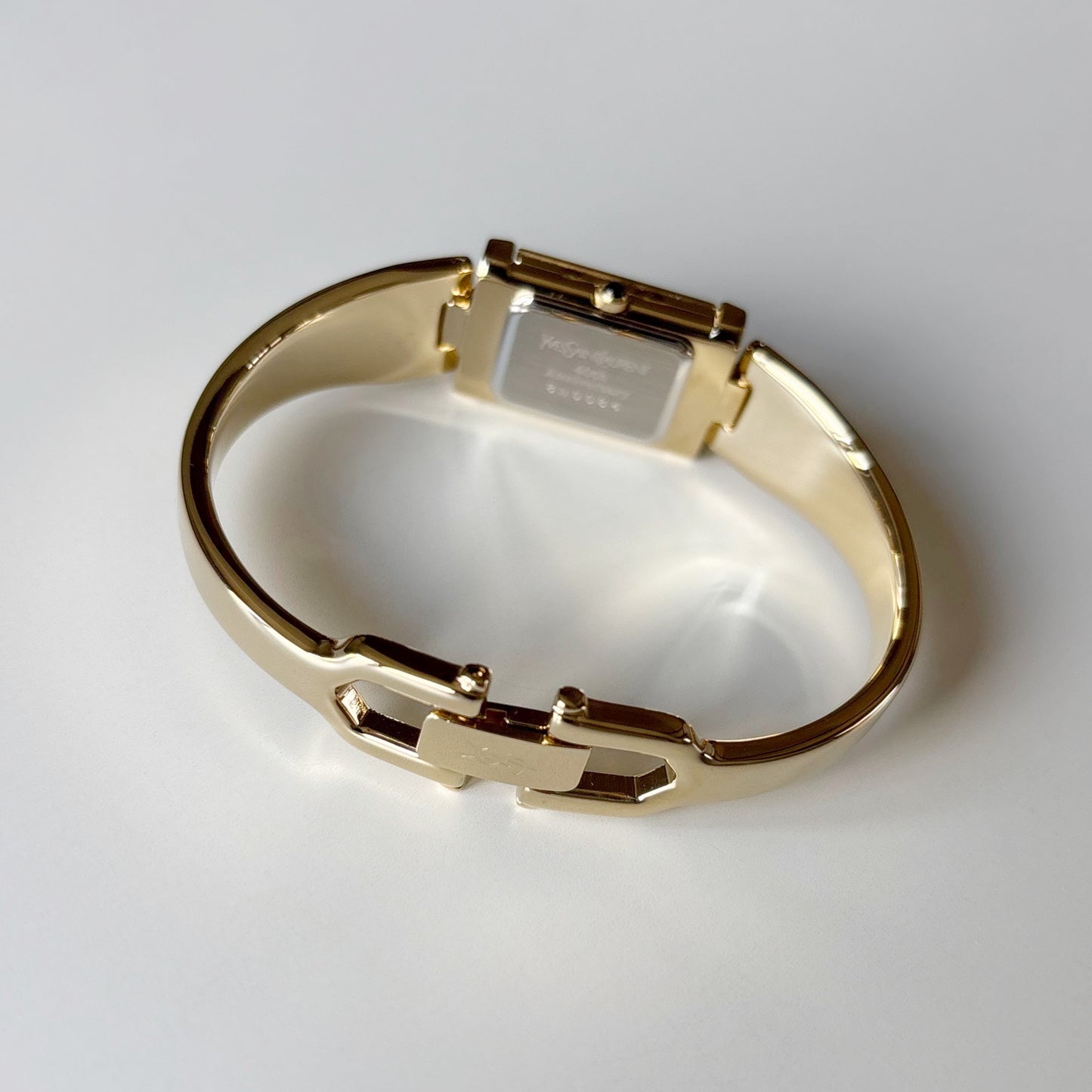 Yves Saint Laurent 1990s Peek-A-Boo Gold Plated Bangle Watch