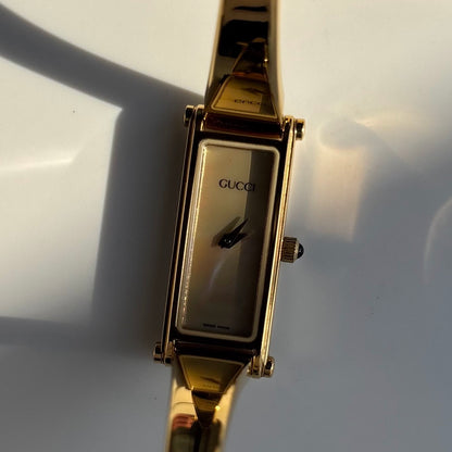 Gucci 1990s Seashell Dial Rectangular Gold Plated Bangle Watch