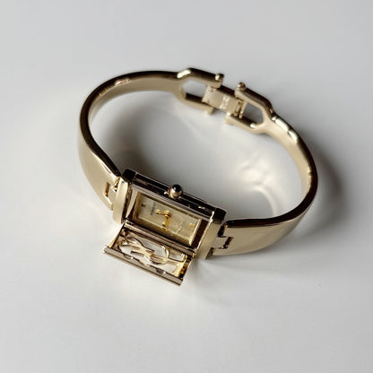 Yves Saint Laurent 1990s Peek-A-Boo Gold Plated Bangle Watch