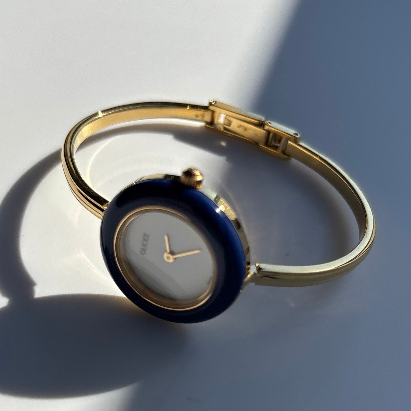 Gucci 1990s Interchangeable Bezel Gold Plated Bangle Watch with 12 bezels, case