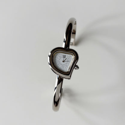 Yves Saint Laurent 1990s Heart Shaped Dial Silver Bangle Watch