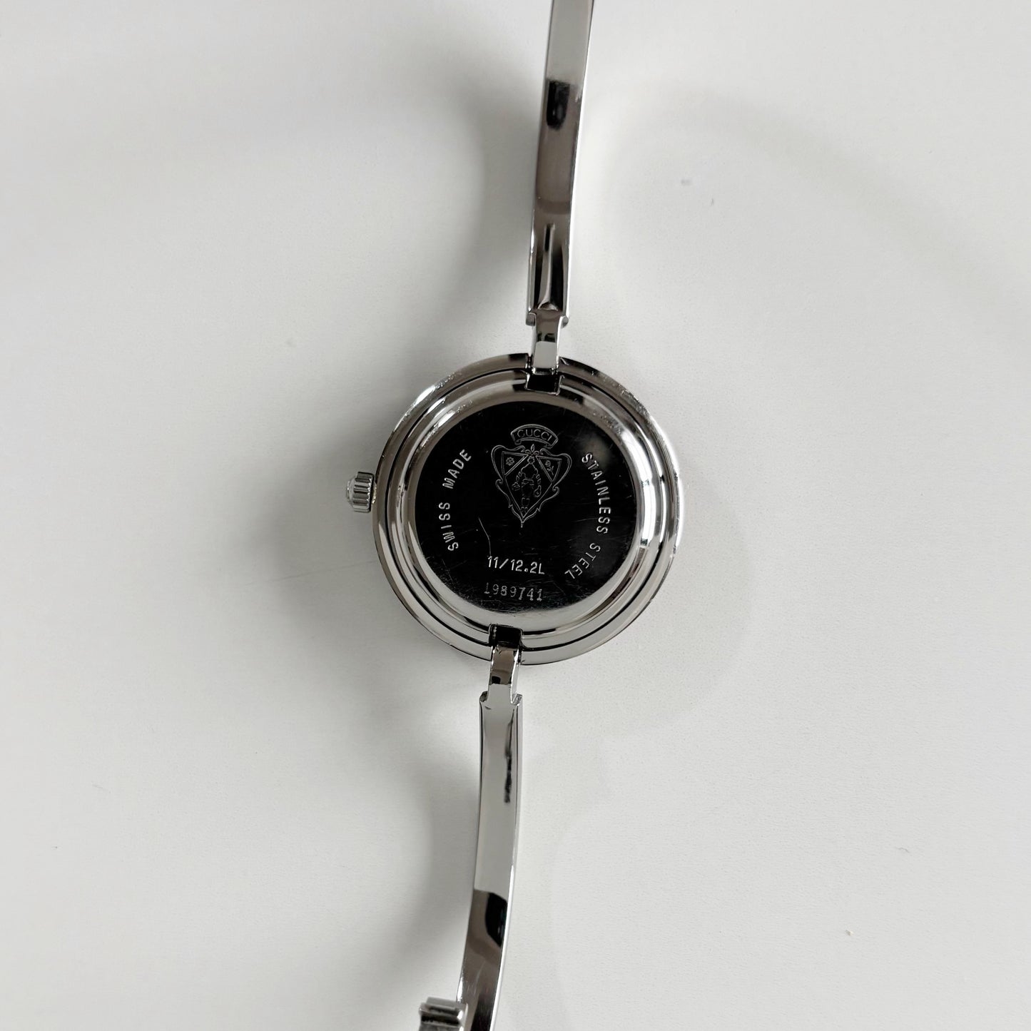 Gucci 1990s Interchangeable Bezel Stainless steel Bangle Watch with 12 bezels, case