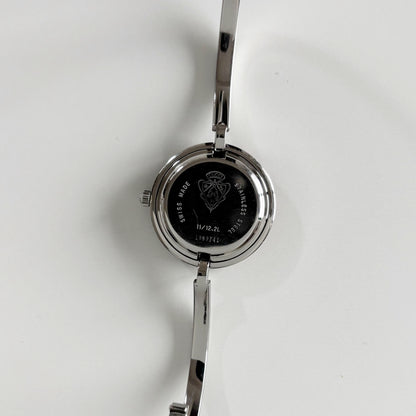 Gucci 1990s Interchangeable Bezel Stainless steel Bangle Watch with 12 bezels, case