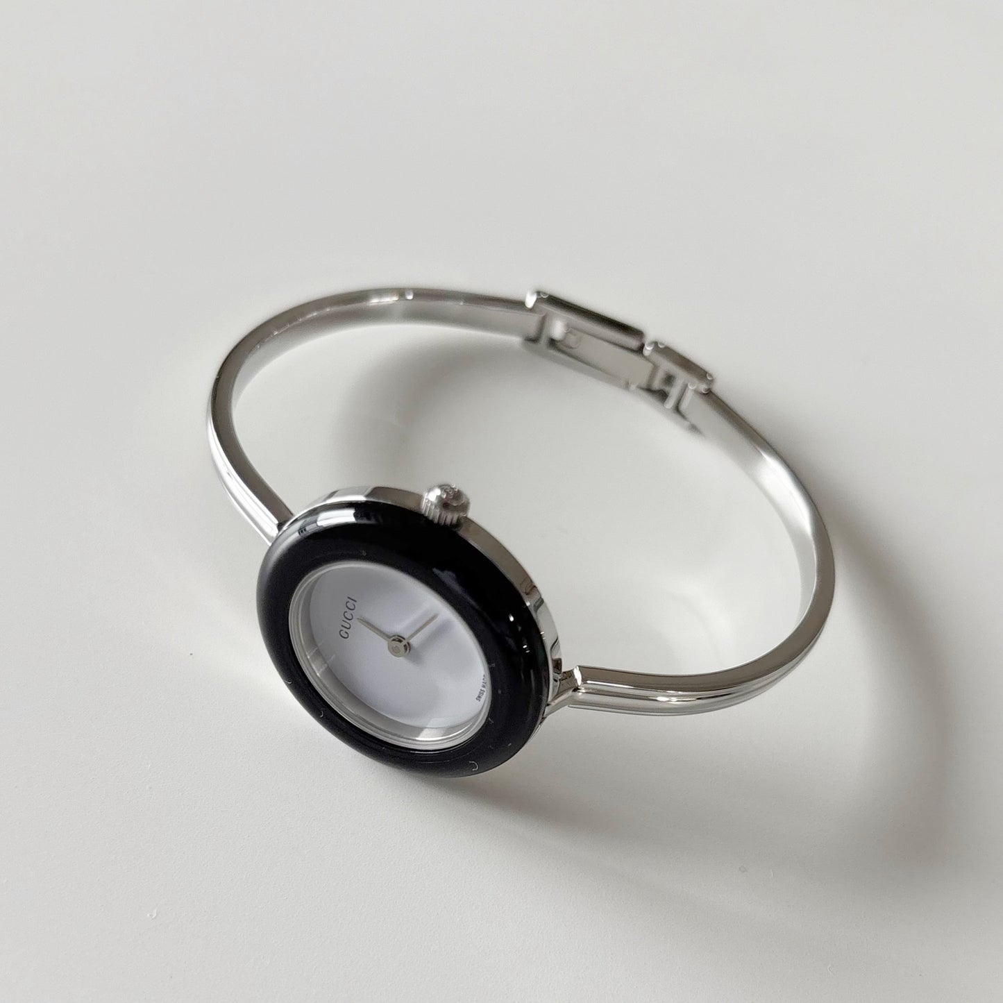 Gucci 1990s Interchangeable Bezel Stainless steel Bangle Watch with 12 bezels, case