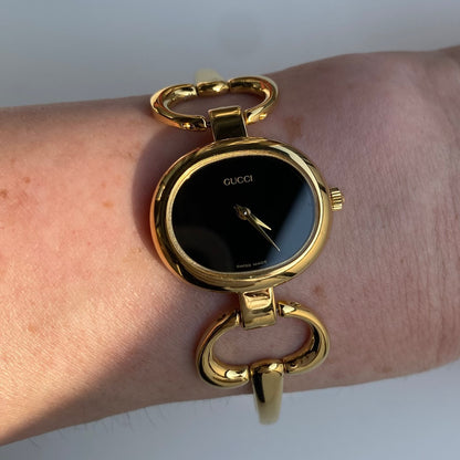 Gucci 1990s Black Dial Gold Plated Bangle Watch