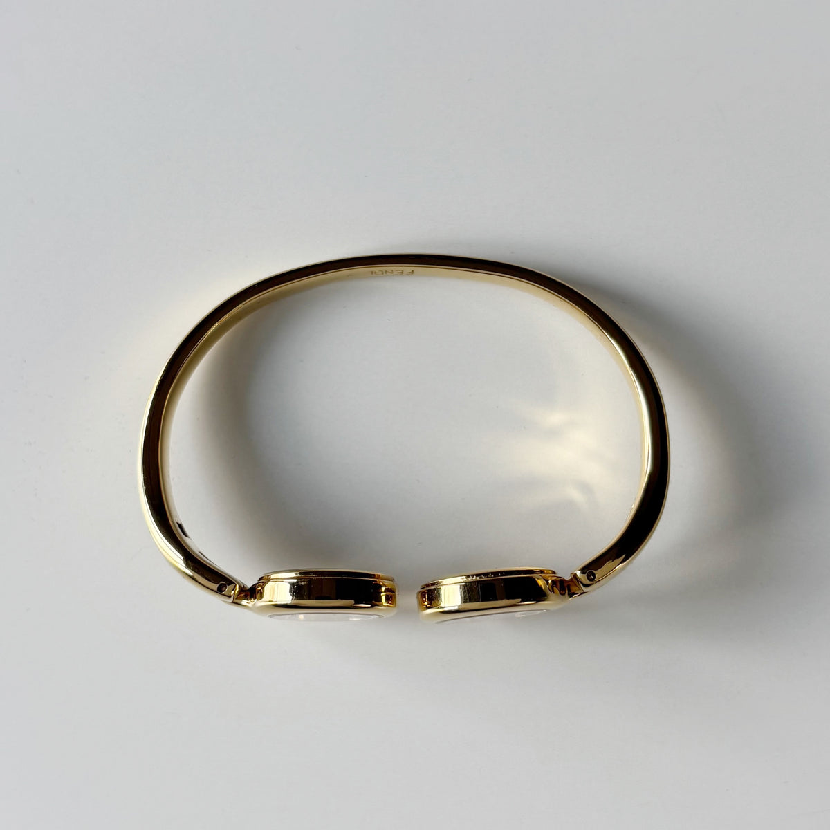 Fendi 1990s Seashell Dial Two Time Zone Gold Plated Bangle Watch