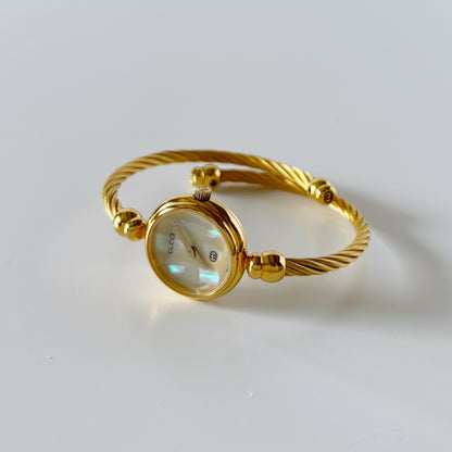 Gucci 1990s Seashell Dial Gold Plated Cable Bangle Watch