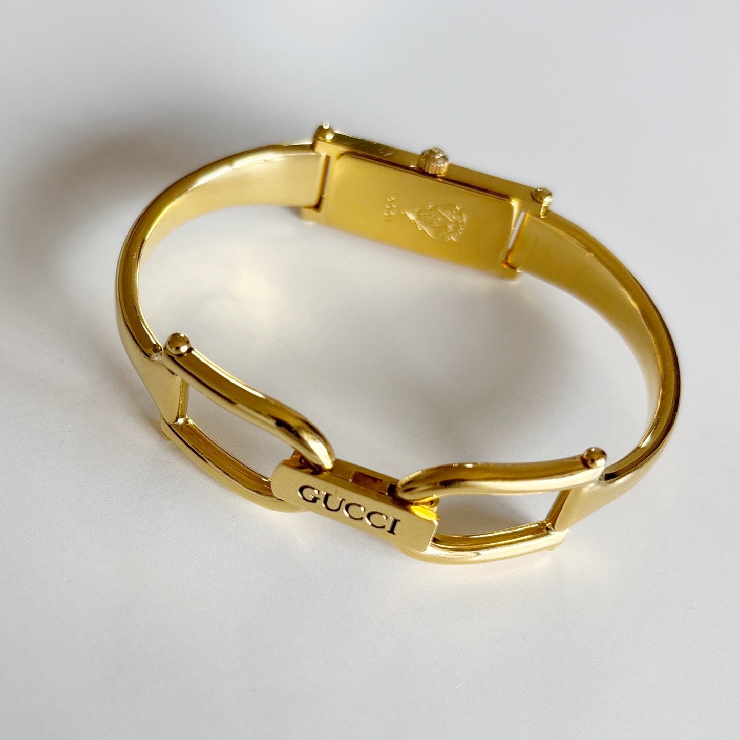 Gucci 1990s Rectangular Seashell Dial Gold Plated Bangle Watch