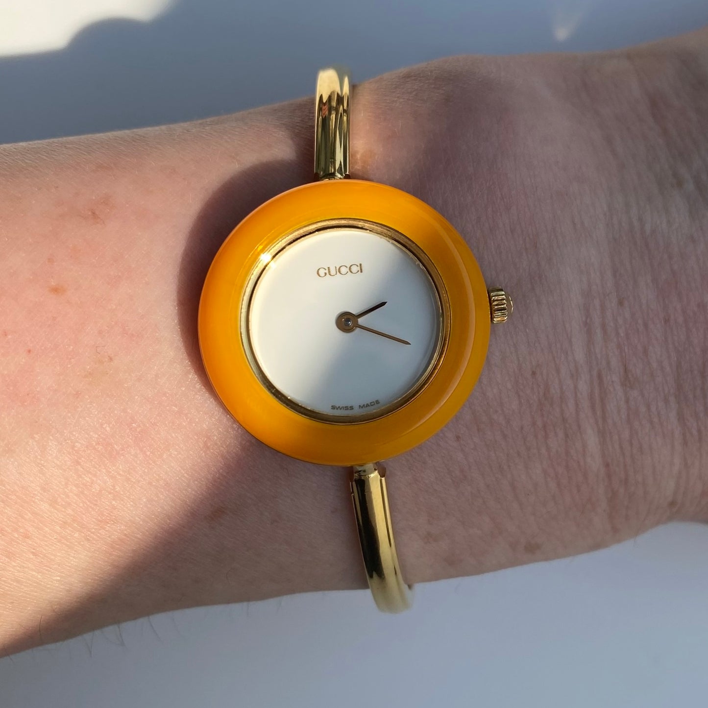 Gucci 1990s Interchangeable Bezel Gold Plated Bangle Watch with 12 bezels, case