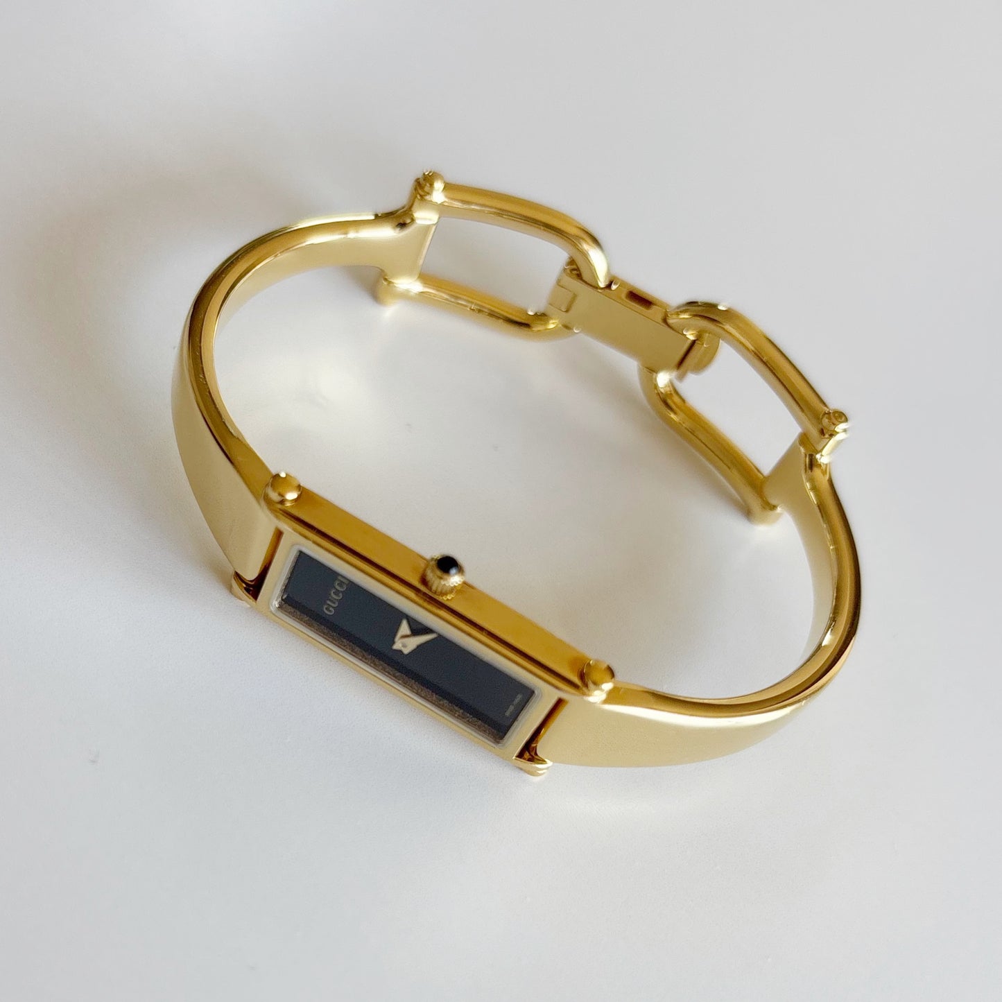 Gucci 1990s Black Dial Gold Plated Bangle Watch