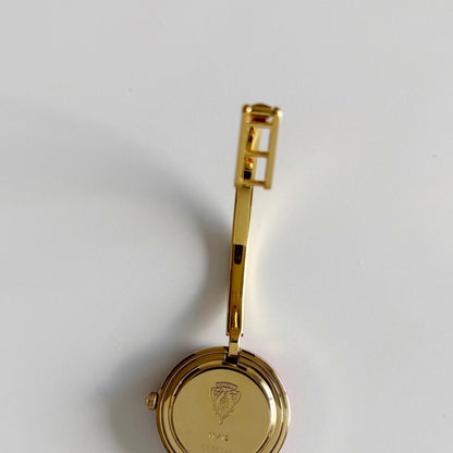 Gucci 1990s Interchangeable Bezel Gold Plated Bangle Watch with 12 bezels, case