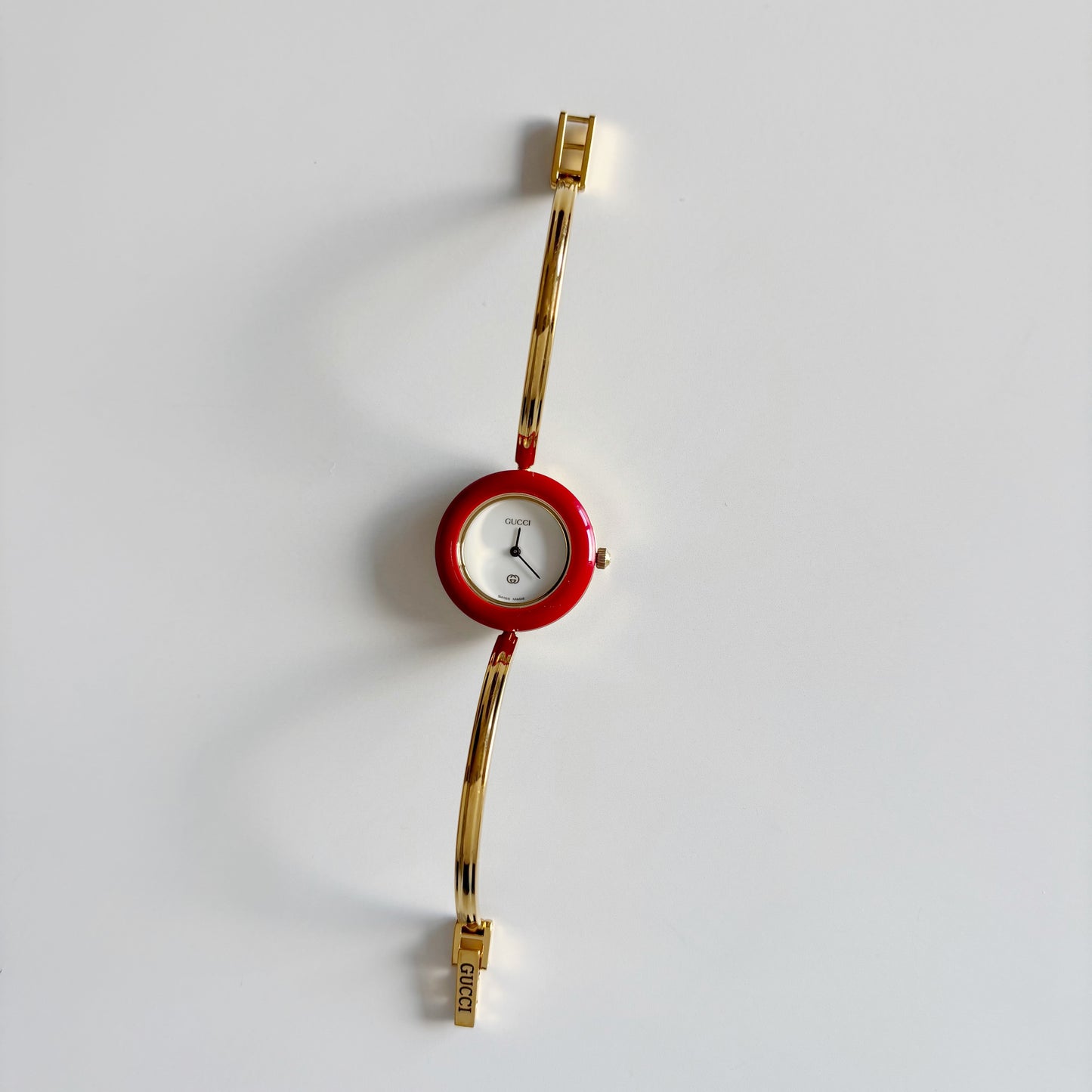 Gucci 1990s Interchangeable Bezel Gold Plated Bangle Watch with 12 bezels, case