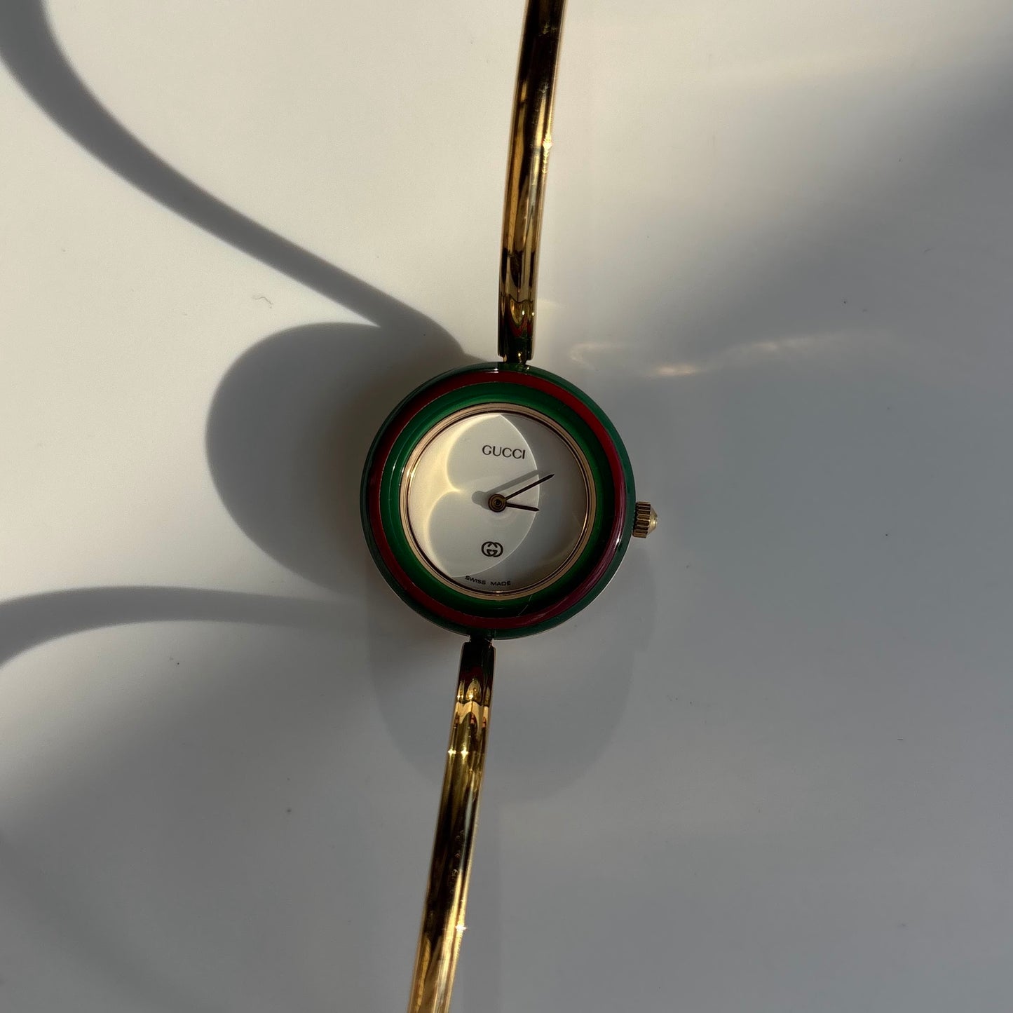 Gucci 1990s Interchangeable Bezel Gold Plated Bangle Watch with 12 bezels, case