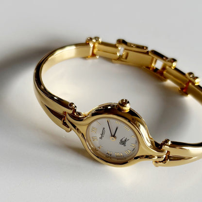 Burberry 1990s Round Dial Gold Plated Bangle Watch