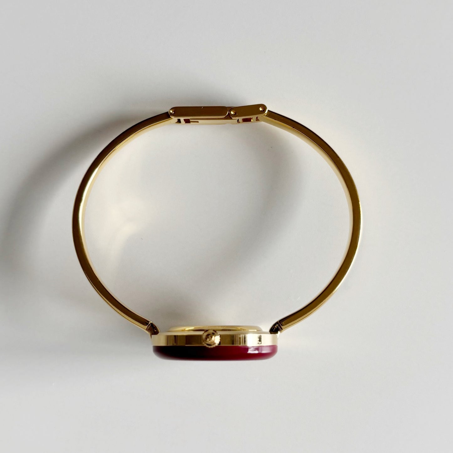 Gucci 1990s Interchangeable Bezel Gold Plated Bangle Watch with 12 bezels, case