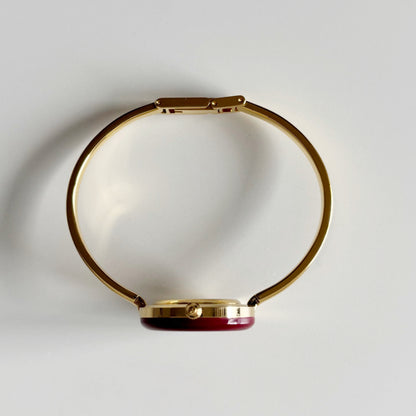 Gucci 1990s Interchangeable Bezel Gold Plated Bangle Watch with 12 bezels, case
