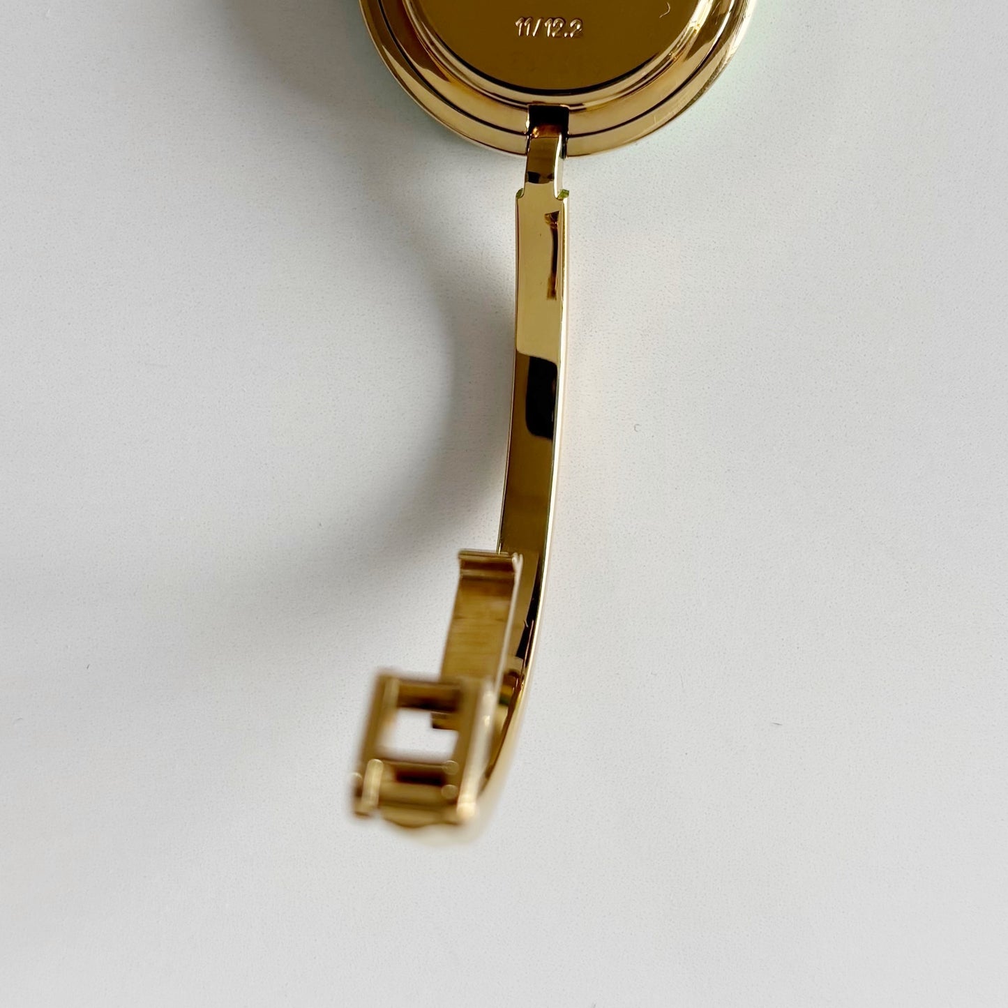 Gucci 1990sInterchangeable Bezel Gold Plated Bangle Watch with 12 bezels, case