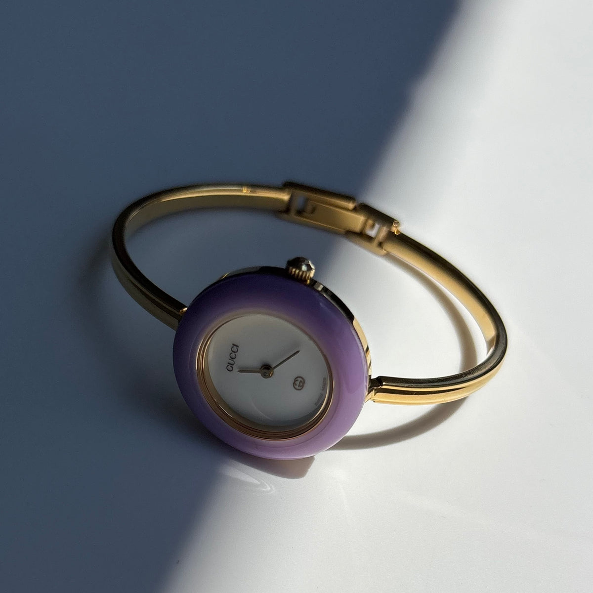 Gucci 1990s Interchangeable Bezel Gold Plated Bangle Watch with 12 bezels, case