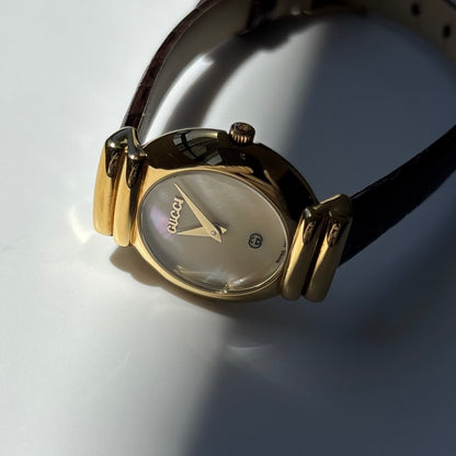 Gucci 1990s Seashell Round Dial Gold Plated Watch