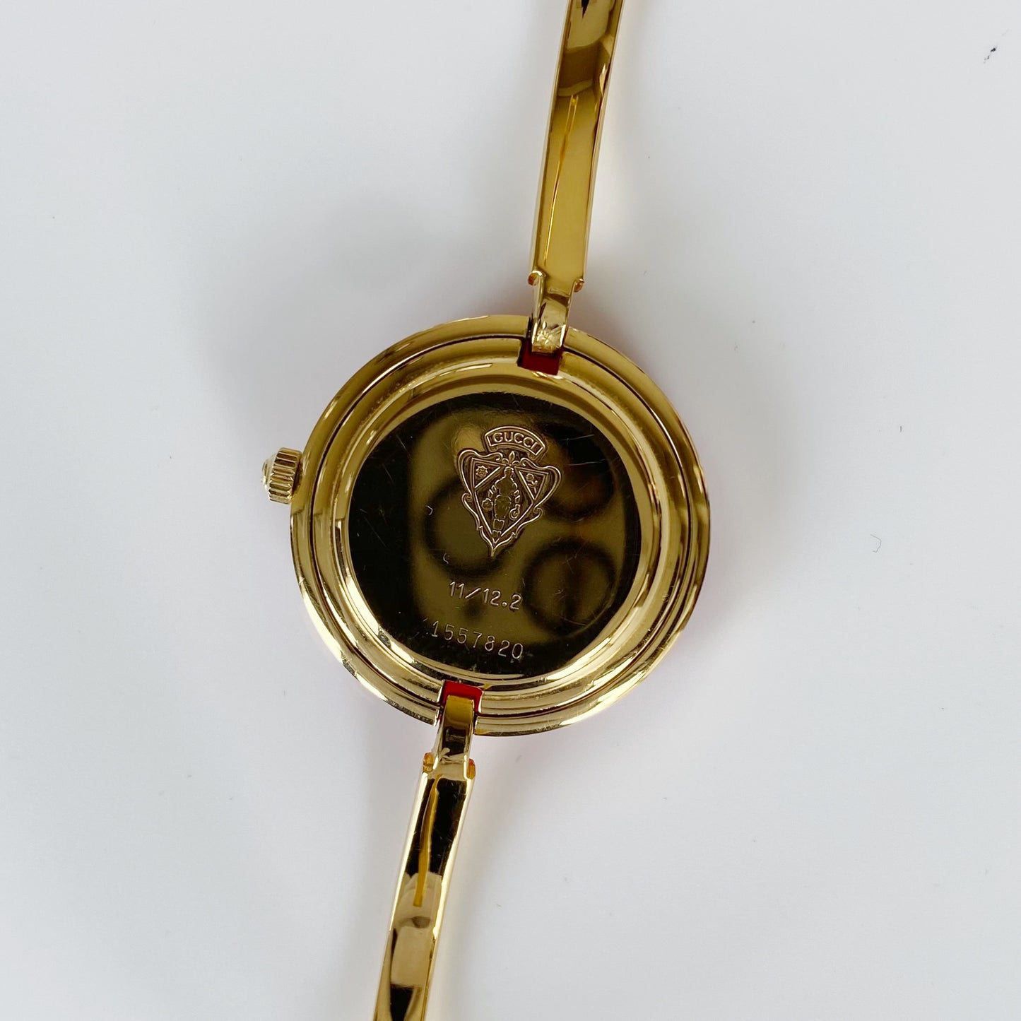 Gucci 1990s Interchangeable Bezel Gold Plated Bangle Watch with 12 bezels, case