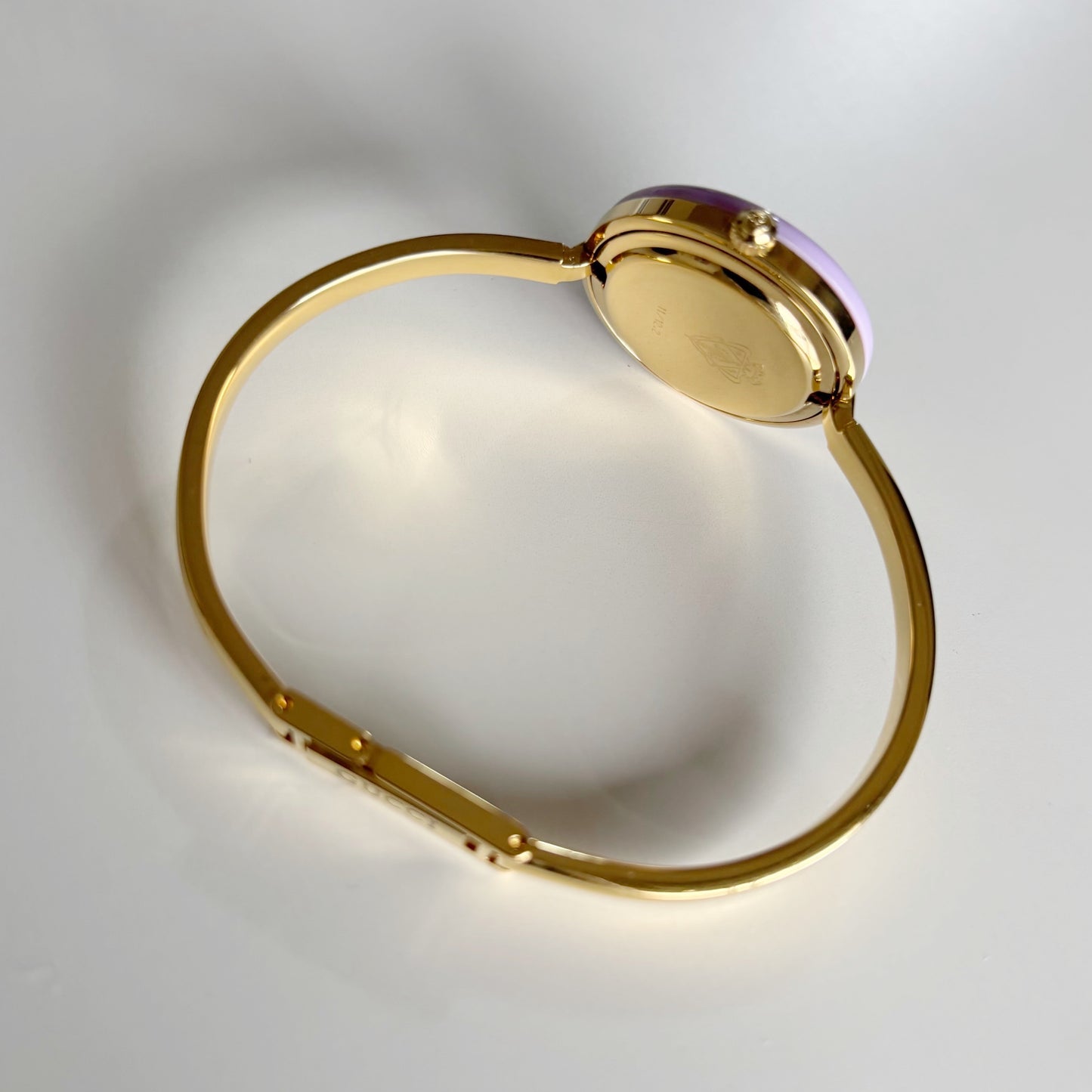 Gucci 1990s Interchangeable Bezel Gold Plated Bangle Watch with 12 bezels, case