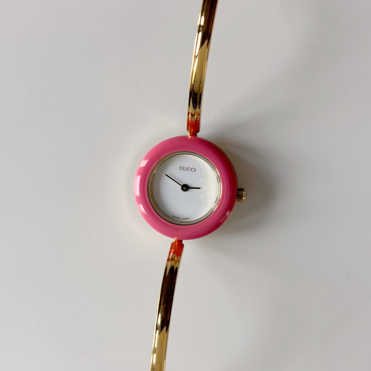 Gucci 1990s Interchangeable Bezel Gold Plated Bangle Watch with case, 12 bezels