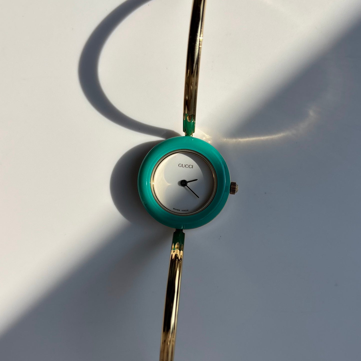 Gucci 1990s Interchangeable Bezel Gold Plated Bangle Watch with 12 bezels, case