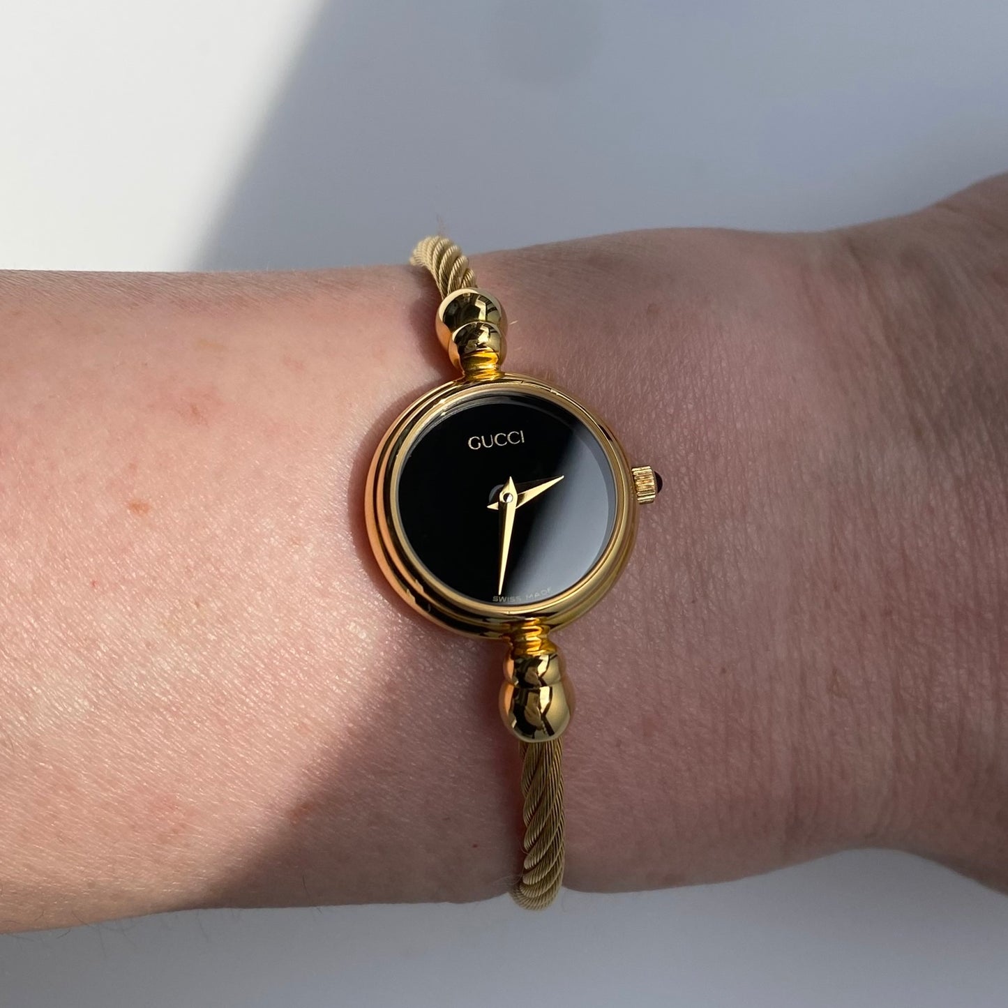 Gucci 1990s Black Dial Gold Plated Cable Bangle Watch