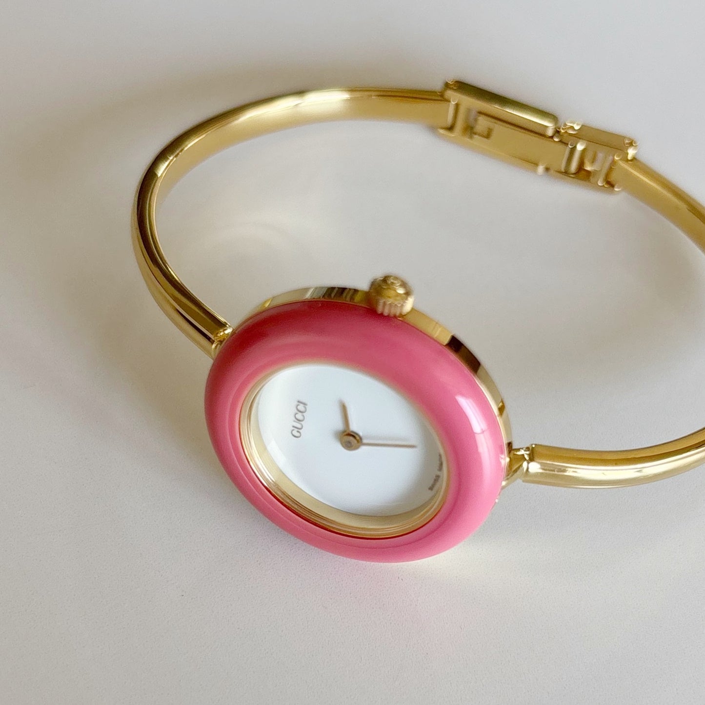 Gucci 1990s Interchangeable Bezel Gold Plated Bangle Watch with 12 bezels, case