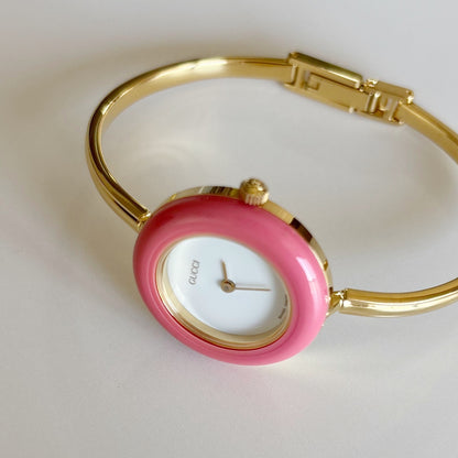 Gucci 1990s Interchangeable Bezel Gold Plated Bangle Watch with 12 bezels, case