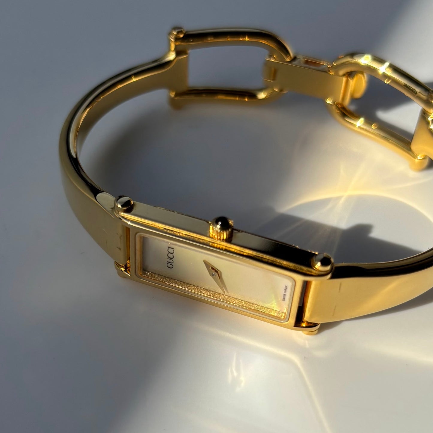 Gucci 1990s Seashell Dial Rectangular Gold Plated Bangle Watch