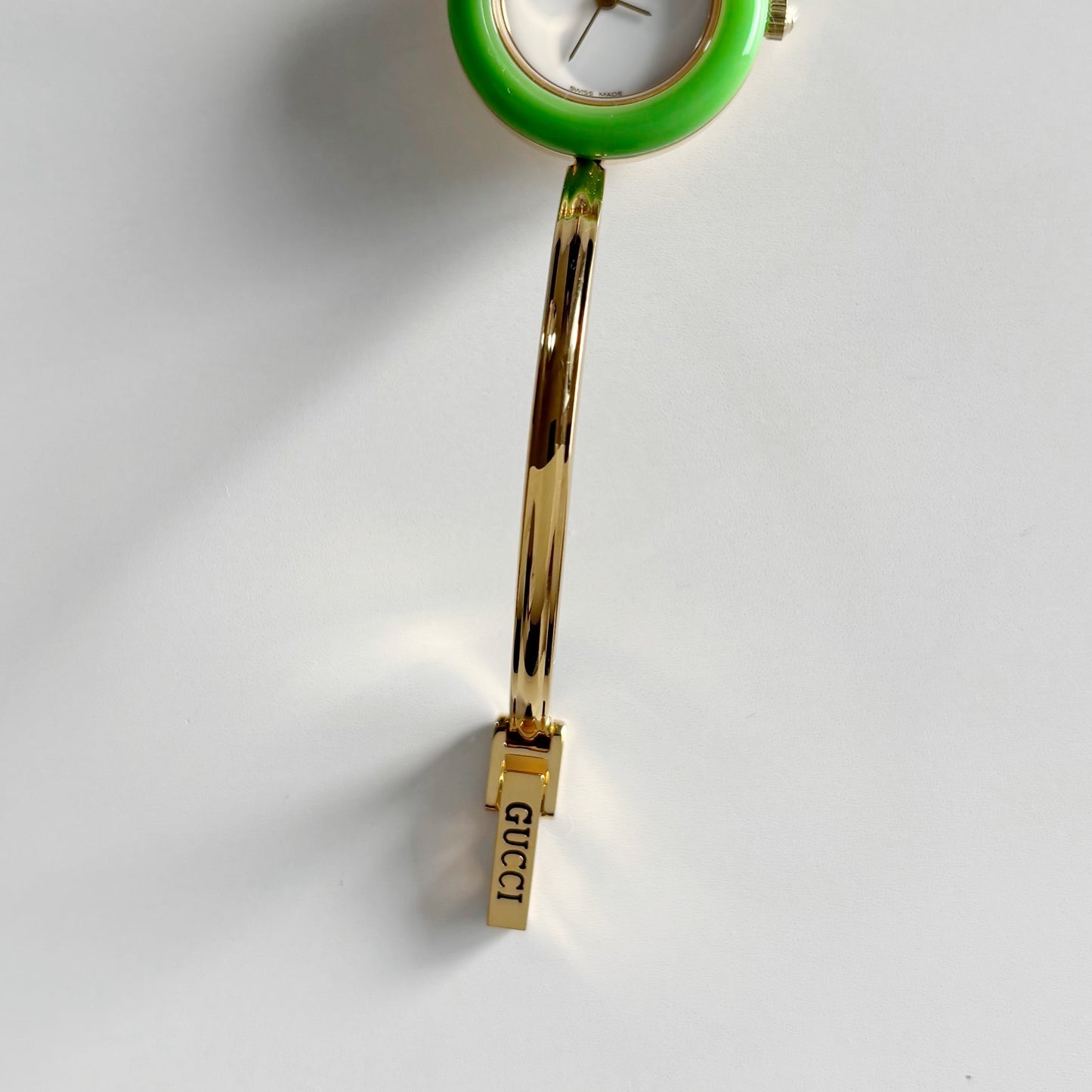 Gucci 1990s Interchangeable Bezel Gold Plated Bangle Watch with 12 bezels, case