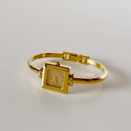 Gucci 1990s Square Dial Gold Plated Bangle Watch