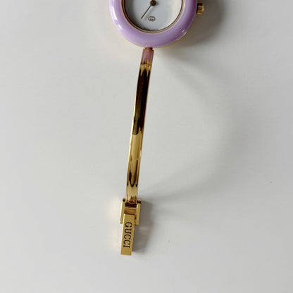 Gucci 1990s Interchangeable Bezel Gold Plated Bangle Watch with 12 bezels, case