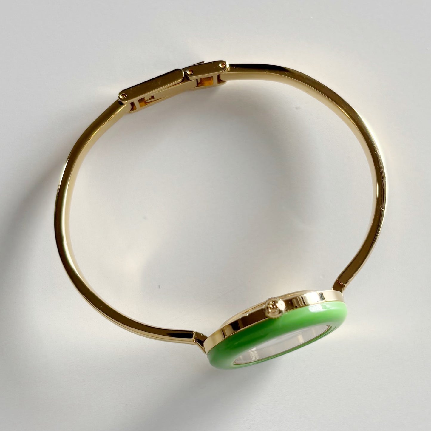 Gucci 1990s Interchangeable Bezel Gold Plated Bangle Watch with 12 bezels, case