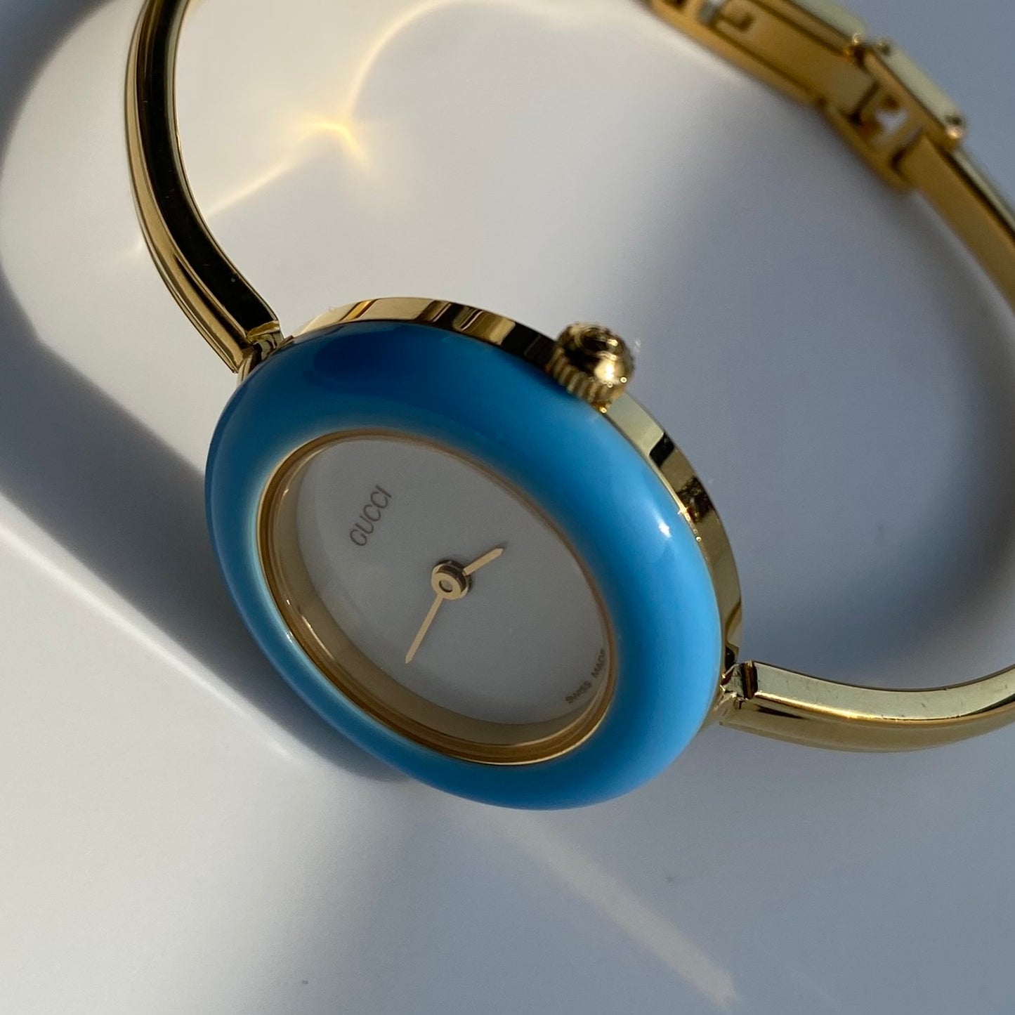 Gucci 1990s Interchangeable Bezel Gold Plated Bangle Watch with 12 bezels, case