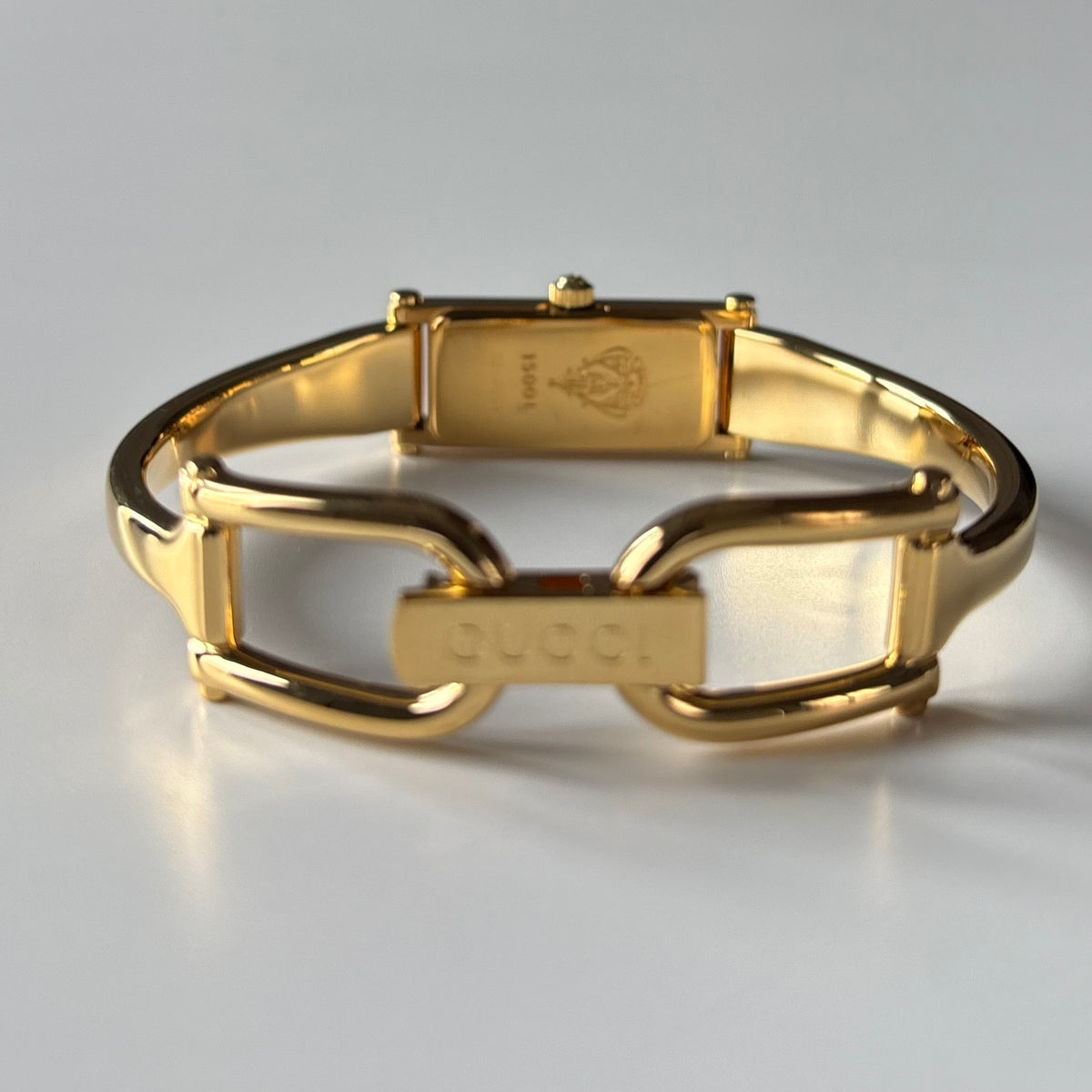 Gucci 1990s Gold Rectangular Dial Gold Plated Bangle Watch