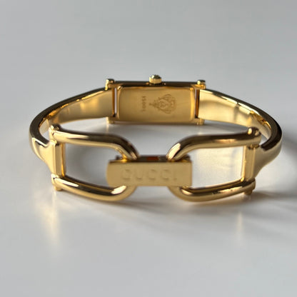 Gucci 1990s Gold Rectangular Dial Gold Plated Bangle Watch