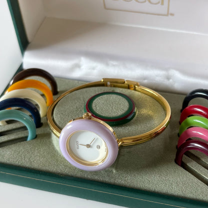 Gucci 1990s Interchangeable Bezel Gold Plated Bangle Watch with 12 bezels, case