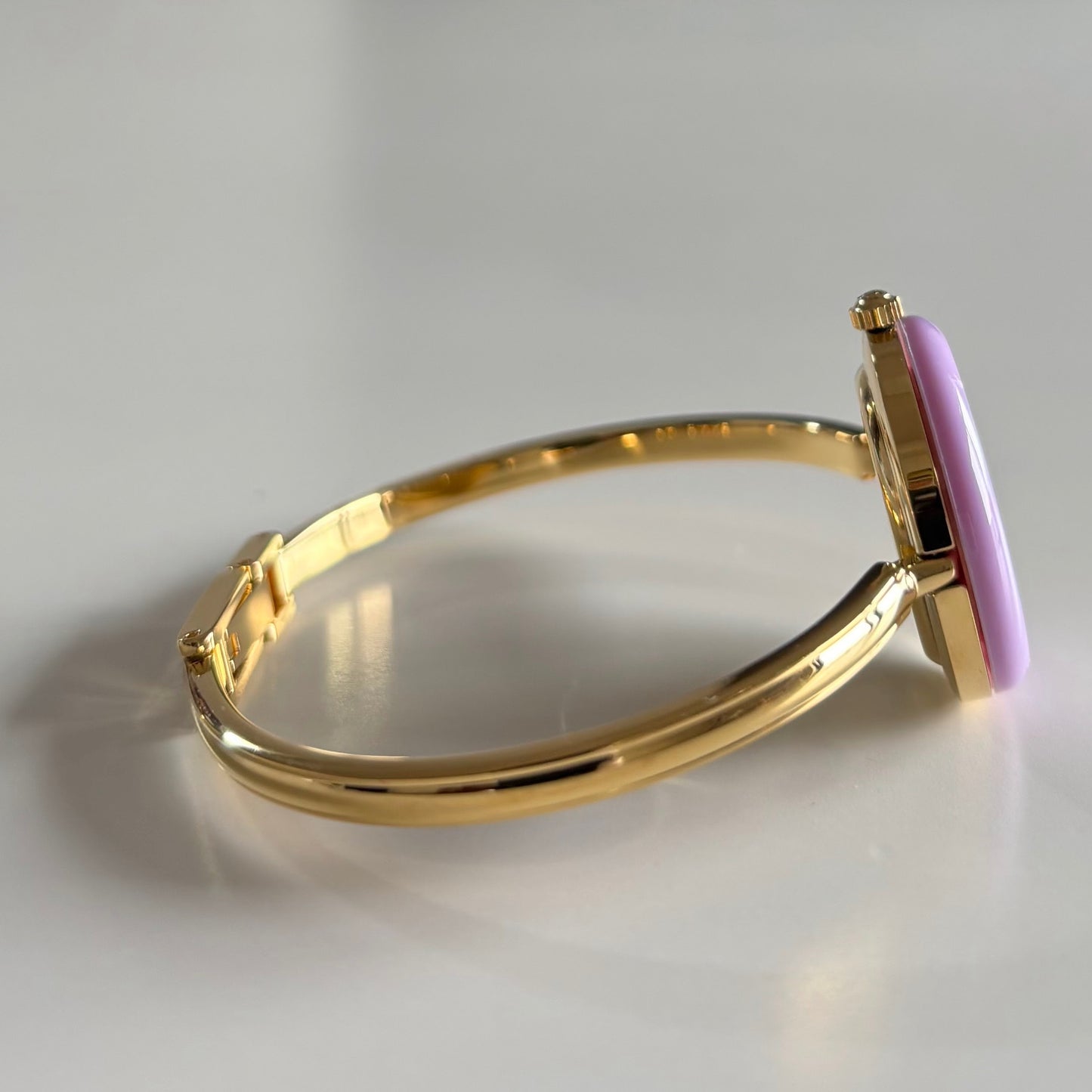 Gucci 1990s Interchangeable Bezel Gold Plated Bangle Watch with 12 bezels, case