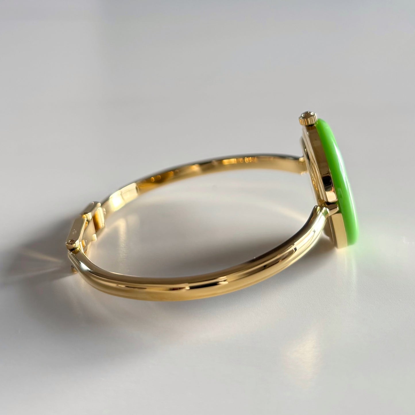 Gucci 1990s Interchangeable Bezel Gold Plated Bangle Watch with 12 bezels, case
