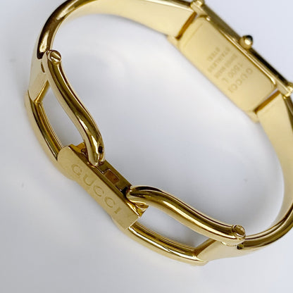 Gucci 1990s Black Dial Rectangular Gold Plated Bangle Watch