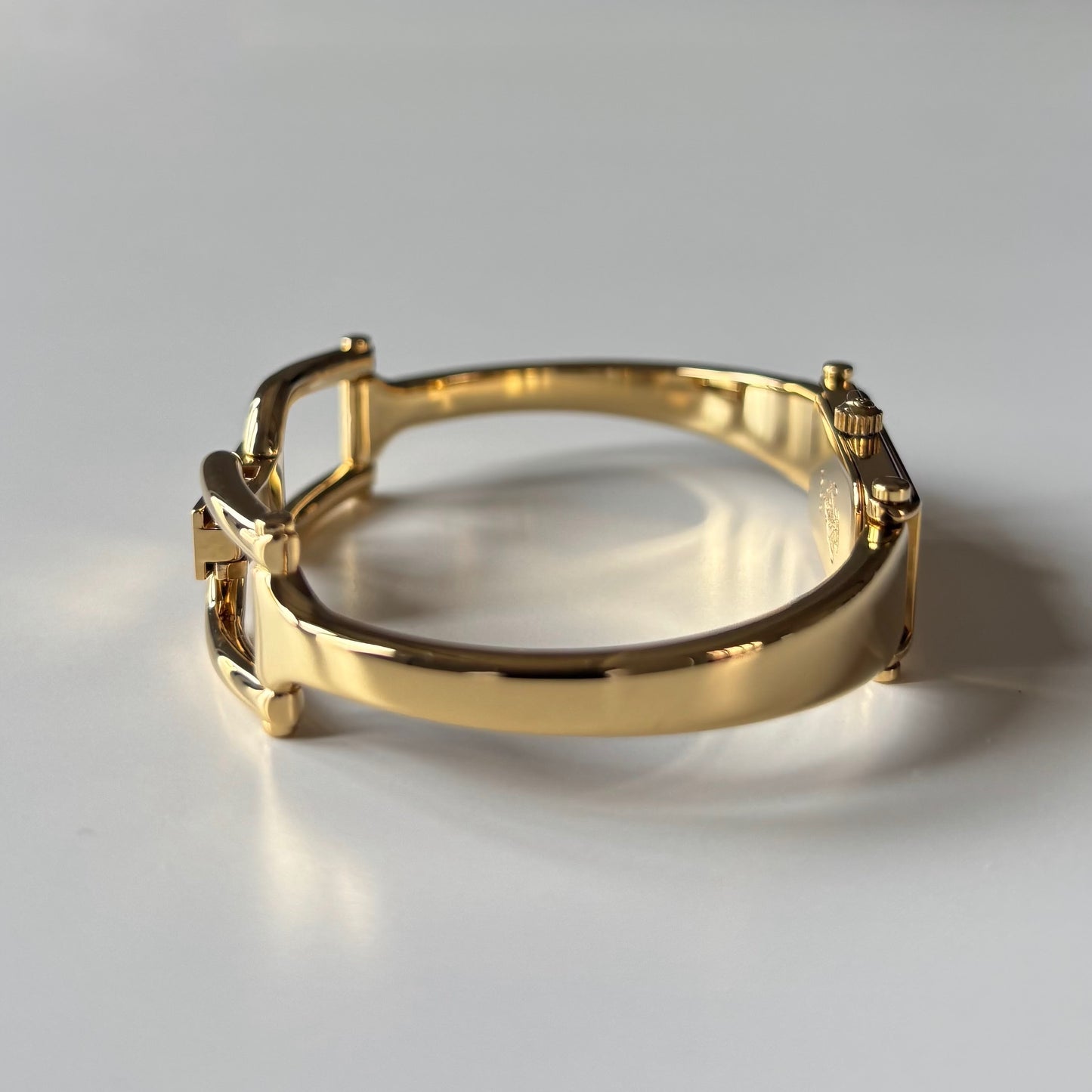 Gucci 1990s Gold Rectangular Dial Gold Plated Bangle Watch