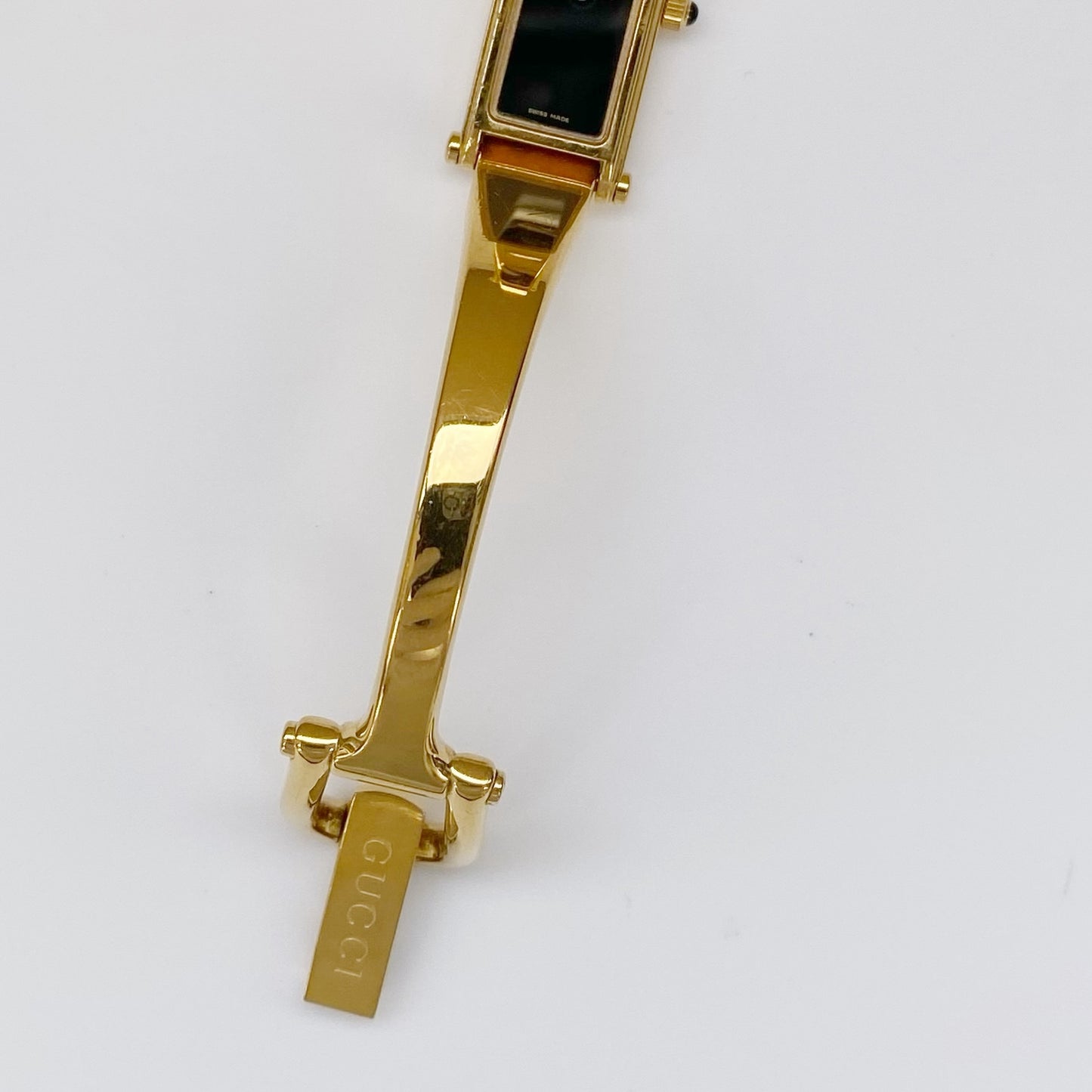 Gucci 1990s Black Dial Gold Plated Rectangular Bangle Watch