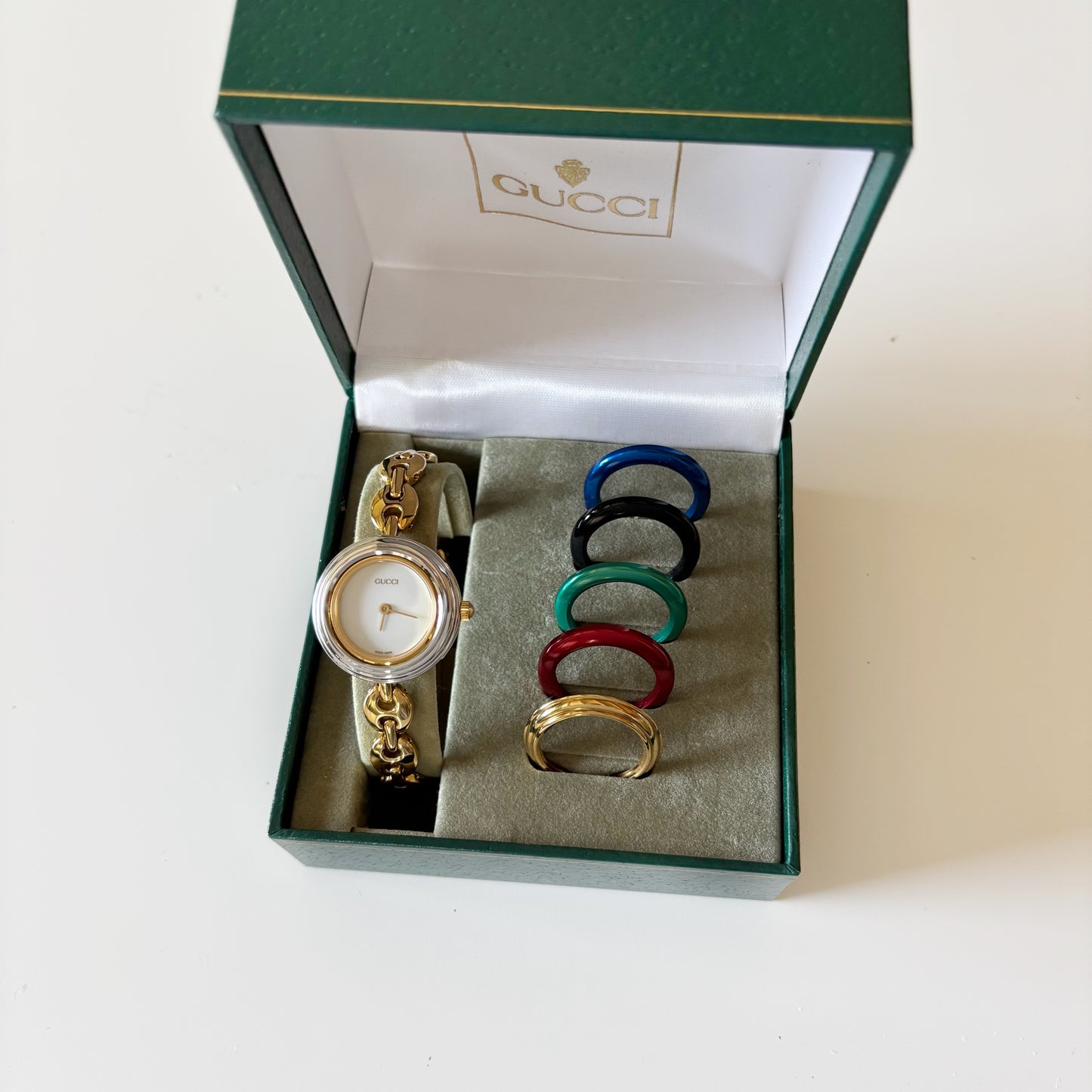 Gucci 1990s Interchangeable Bezel Gold Plated Watch with 6 bezels, case (165m)